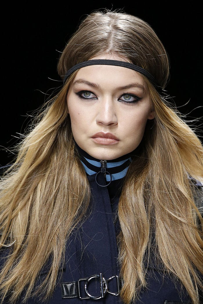 Gigi Hadid modelling the scuba pumps-boots on the Versace fall 2016 fashion show runway.