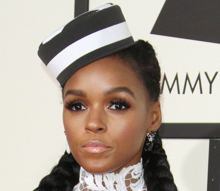 Janelle Monáe completed her sleek braids with a black-and-white pillbox hat, adding a touch of vintage sophistication to her bold Grammy ensemble