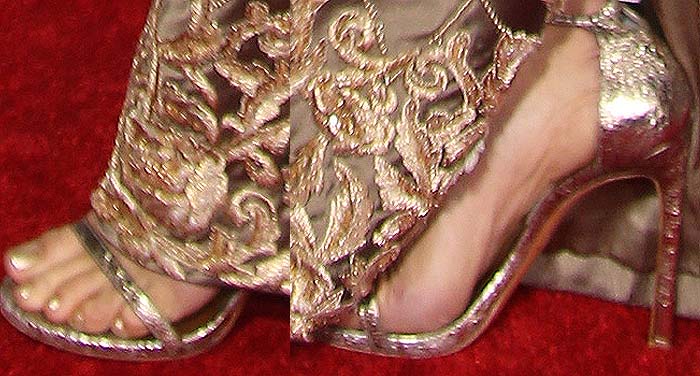 Jenna completed her gilded red-carpet look with sparkling Stuart Weitzman "Nudist" sandals that echoed the metallic tones of her couture gown