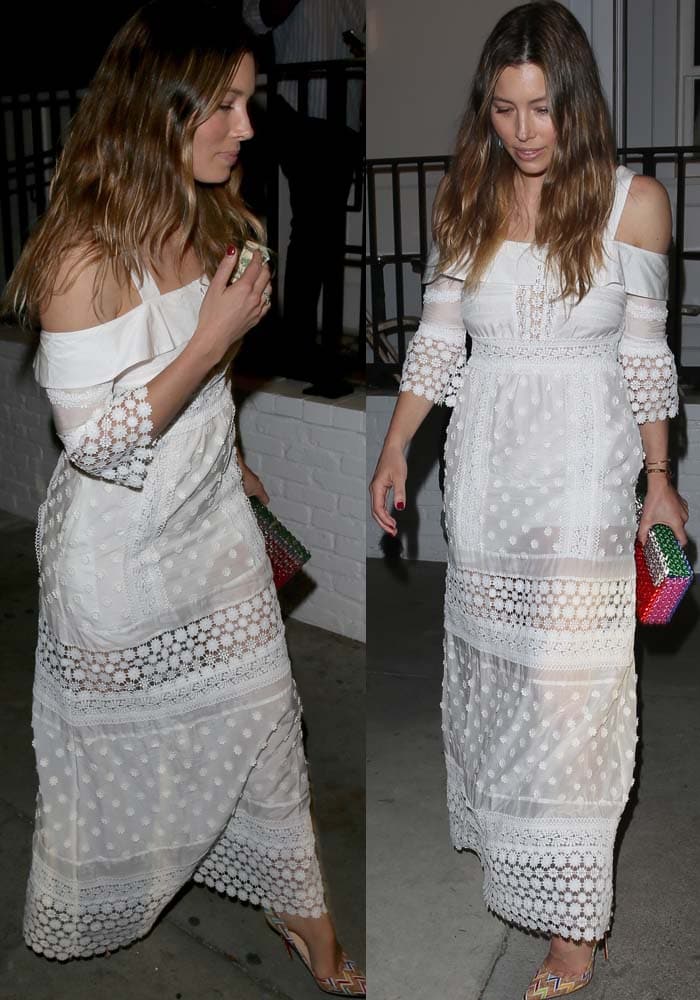 Jessica Biel bares her shoulders in a romantic white Self-Portrait dress, pairing the intricate lace design with colorful Christian Louboutin So Kate pumps