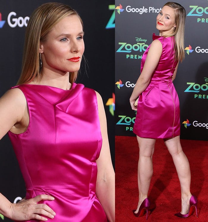 Kristen Bell dazzles in a sleek fuchsia dress paired with matching heels, turning heads at the Zootopia premiere