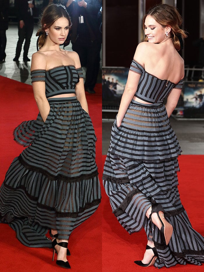 Lily James pairs her sheer striped Erdem Spring 2016 skirt and crop top with black satin Aquazzura Candela pointed-toe pumps and ankle ties