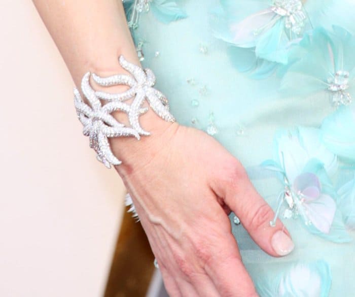 Cate Blanchett accessorizes her seafoam Armani Privé gown with a Tiffany Co. Blue Book diamond-encrusted starfish cuff at the 2016 Oscars