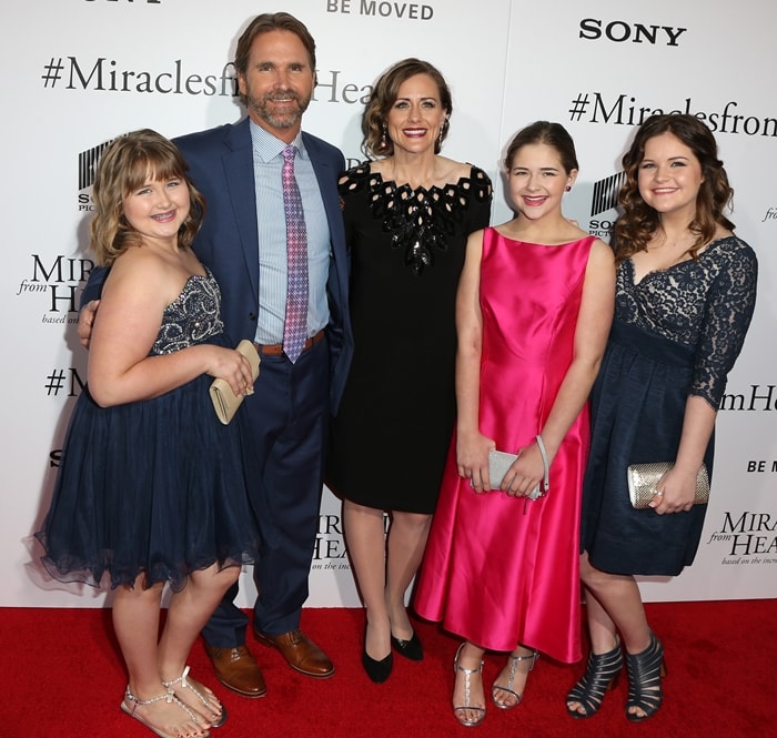 The Beam family, including Christy Beam and her daughters Annabel, Adelynn, and Abigail, pose together at the "Miracles from Heaven" premiere in Hollywood on March 9, 2016