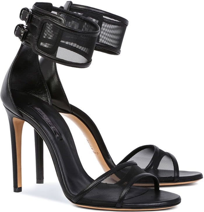 Casadei's black mesh sandals combine translucent panels, leather trim, and double-buckle ankle cuffs to create an architectural evening sandal with a lightweight appearance