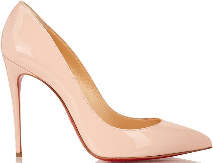 Christian Louboutin’s nude patent Pigalle Follies pumps refine the house’s iconic red-sole silhouette with a sharply pointed toe, low-cut vamp, and a sleek stiletto heel designed for elegance with added wearability