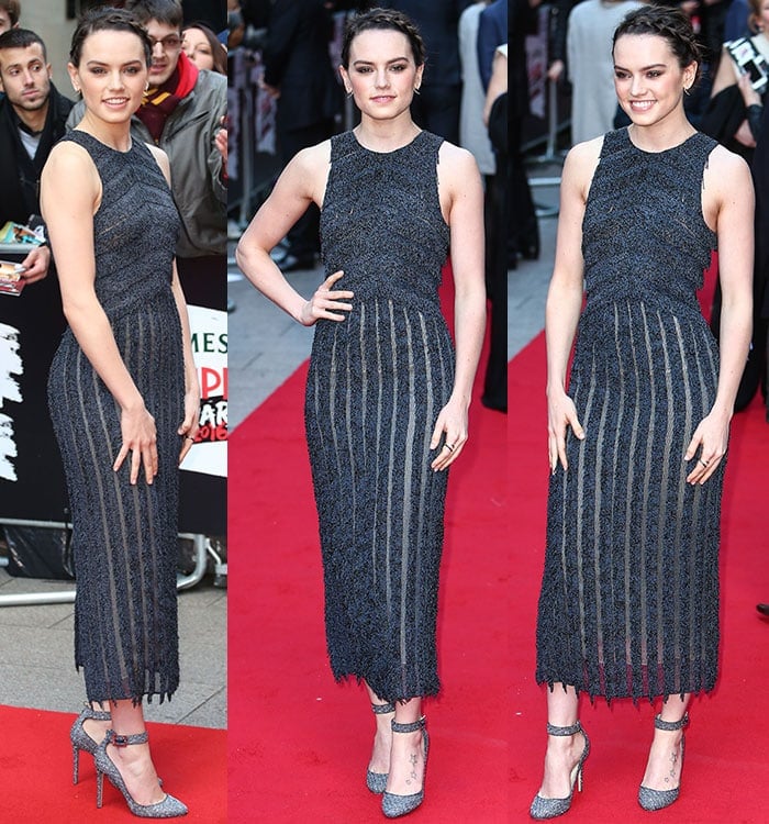 Daisy posed from multiple angles in the fringe-trimmed Boss gown, revealing how the vertical sheer stripes worked with the Jimmy Choo pumps to elongate the silhouette