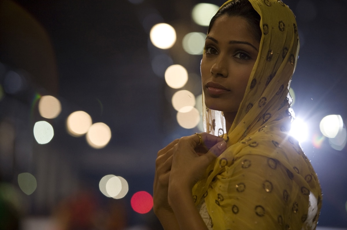 Freida Pinto captivates as Latika in Slumdog Millionaire, embodying grace and resilience in this iconic role