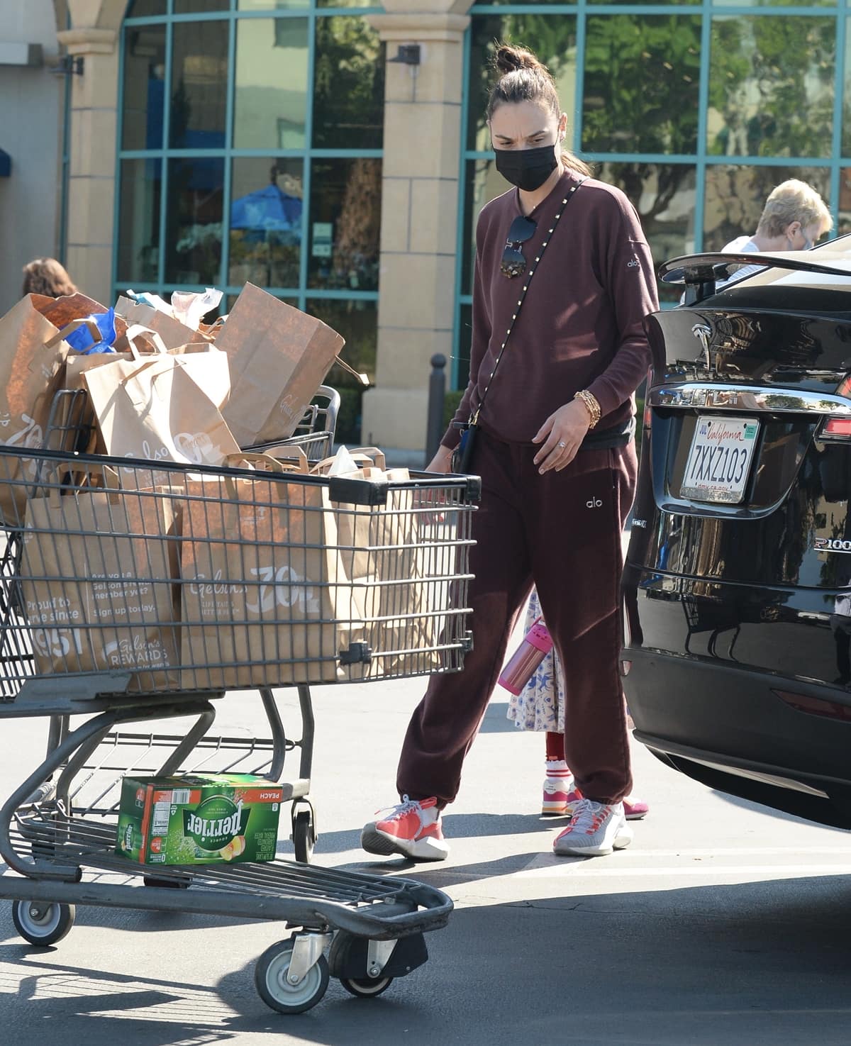 Gal Gadot keeps it effortlessly casual in burgundy Alo Yoga loungewear and Reebok Sole Fury SE sneakers while grocery shopping at Gelson’s Markets in Studio City on October 14, 2021