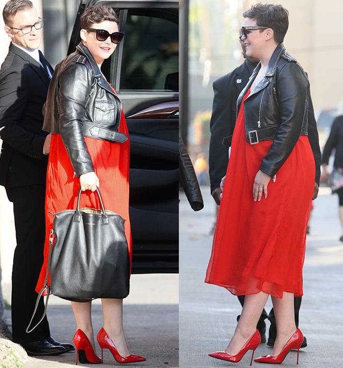 Ginnifer Goodwin shows off her tousled pixie cut and minimal makeup while pairing a flowing red maternity dress with a cropped leather biker jacket and glossy Kurt Geiger “Britton” pumps