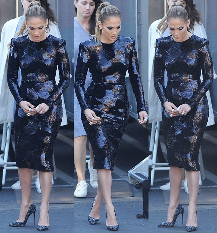 The geometric sequin pattern and padded shoulders of Jennifer Lopez’s Alex Perry dress create a distinctly ’80s-inspired power-dressing effect