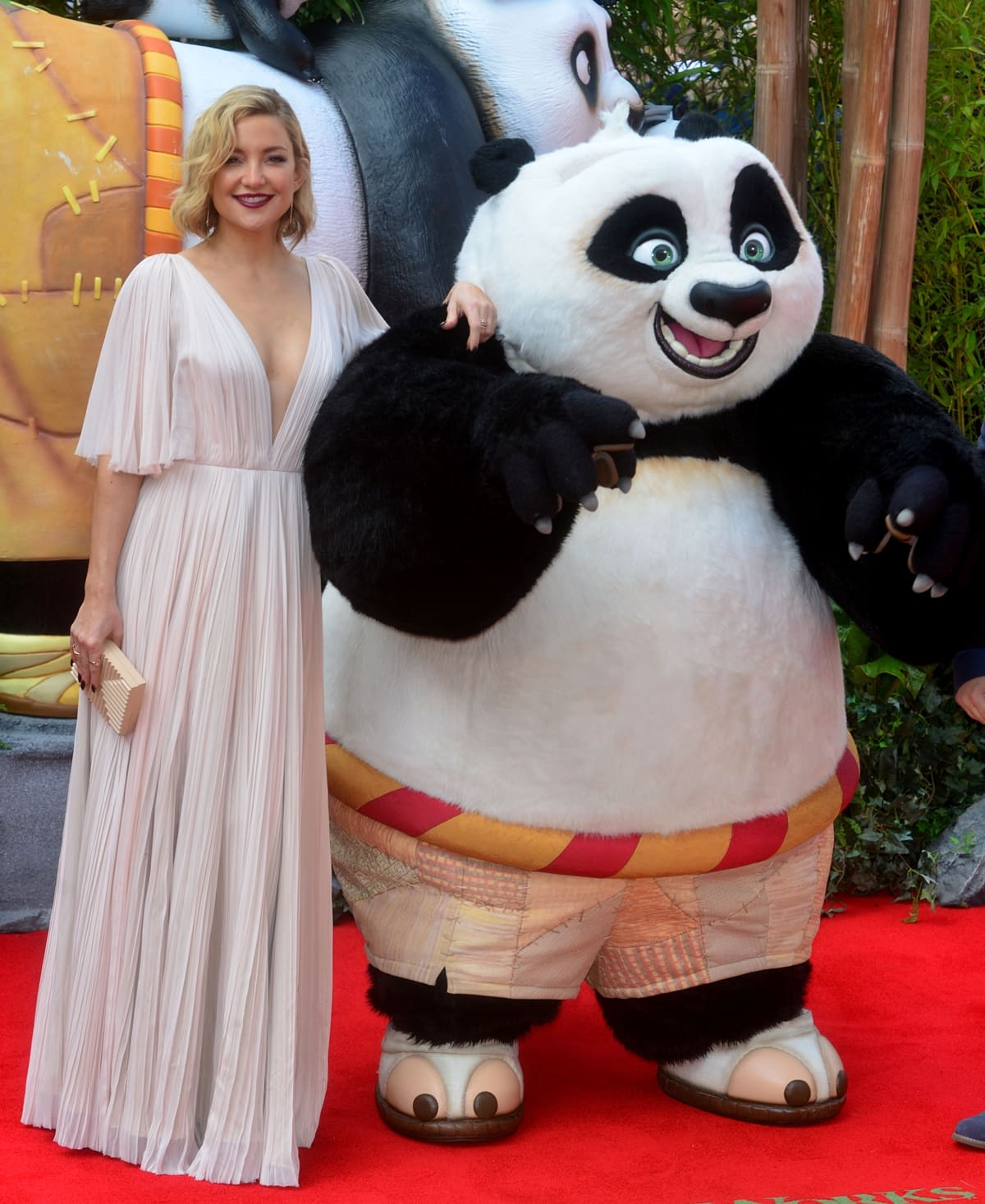 Kate Hudson struck an elegant note in a flowing blush gown as she posed alongside Po at the European premiere of Kung Fu Panda 3