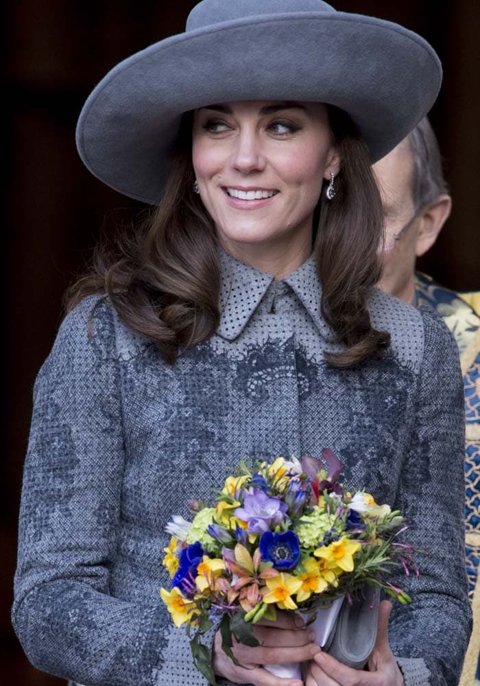 Kate Middleton attends the Commonwealth Day service at Westminster Abbey in London on March 14, 2016, finishing her Erdem ensemble with a wide-brim John Boyd hat