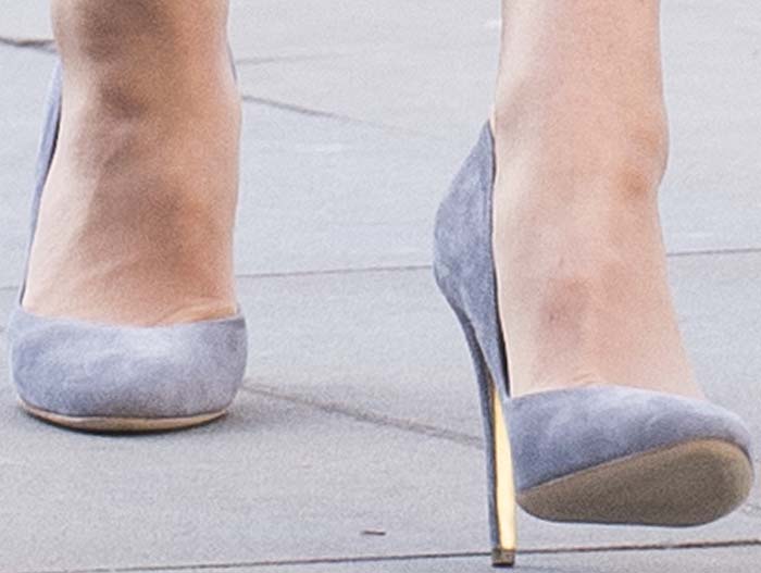 Kate Middleton steps out in gray suede Rupert Sanderson “Winona” pumps, a timeless pointed-toe style that perfectly complements her tonal ensemble
