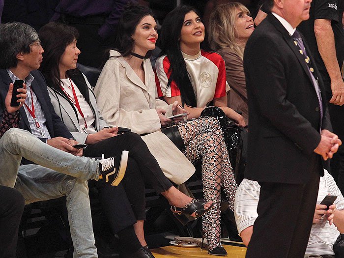Kendall Jenner rocked an Opening Ceremony jacket with sexy over-the-knee suede sandals