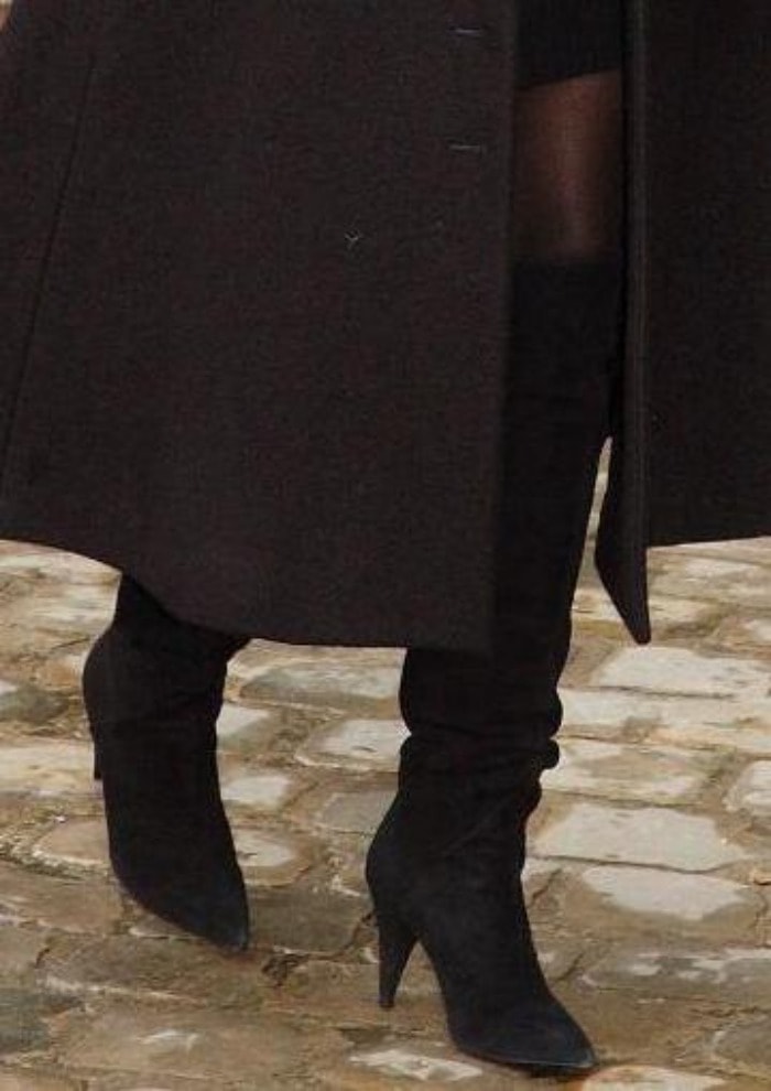 Kris Jenner steps out in sleek black suede thigh-high boots with pointed toes and stiletto heels