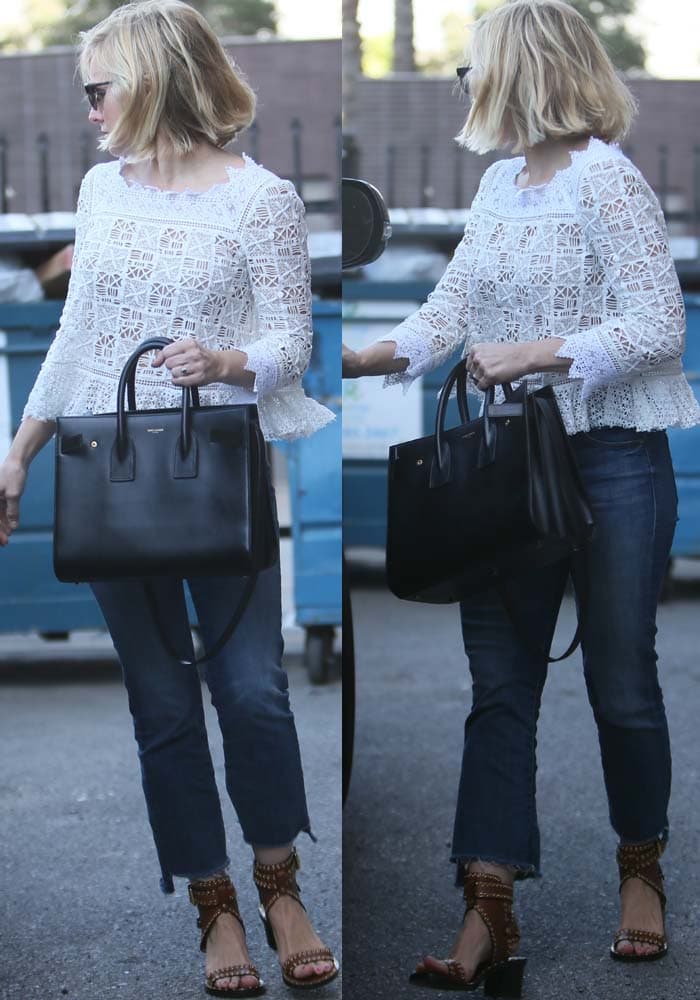 Kristen Bell steps out in Los Angeles wearing flared cutoff jeans with an embroidered white lace top, accessorizing with a Saint Laurent tote and Isabel Marant “Jaeryn” eyelet gladiator sandals
