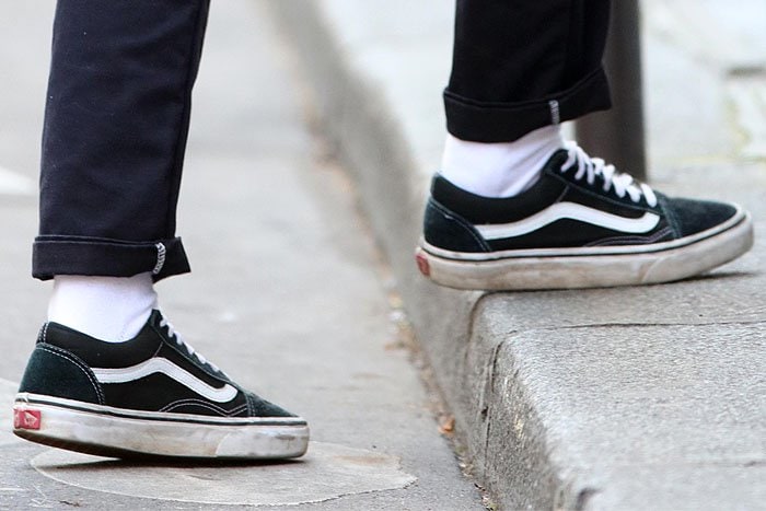 Kristen Stewart's dirty and beat-up black Vans 'Old Skool' sneakers