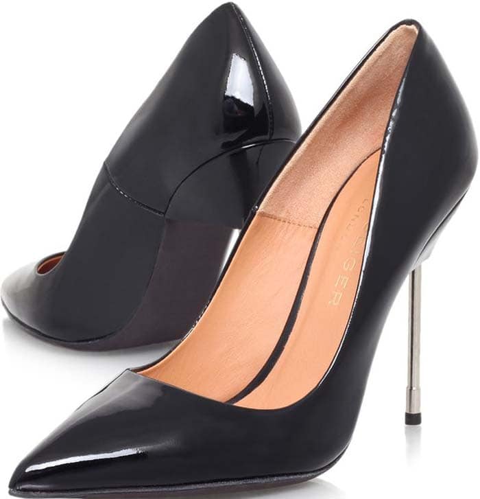 Defined by mirror-shine patent leather, a sharply pointed toe, and an architectural metal stiletto heel, the Britton pump transforms a timeless black court shoe into a modern statement piece