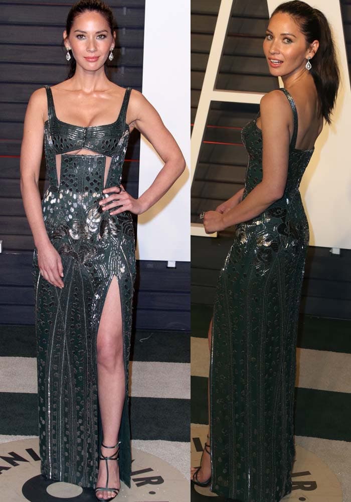 Olivia Munn stuns in a sculpted forest-green J. Mendel gown with intricate embellishments and a thigh-high slit at the 2016 Vanity Fair Oscar Party