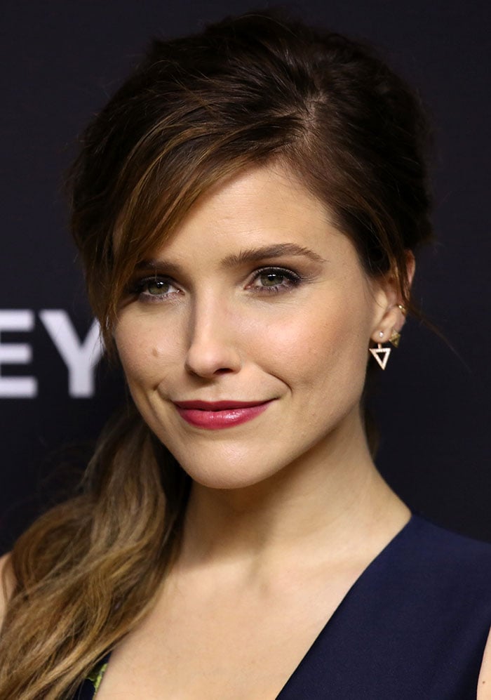 Sophia Bush paired a side-swept ponytail and berry-red lipstick with geometric Ilana Ariel earrings for the 2016 PaleyFest appearance