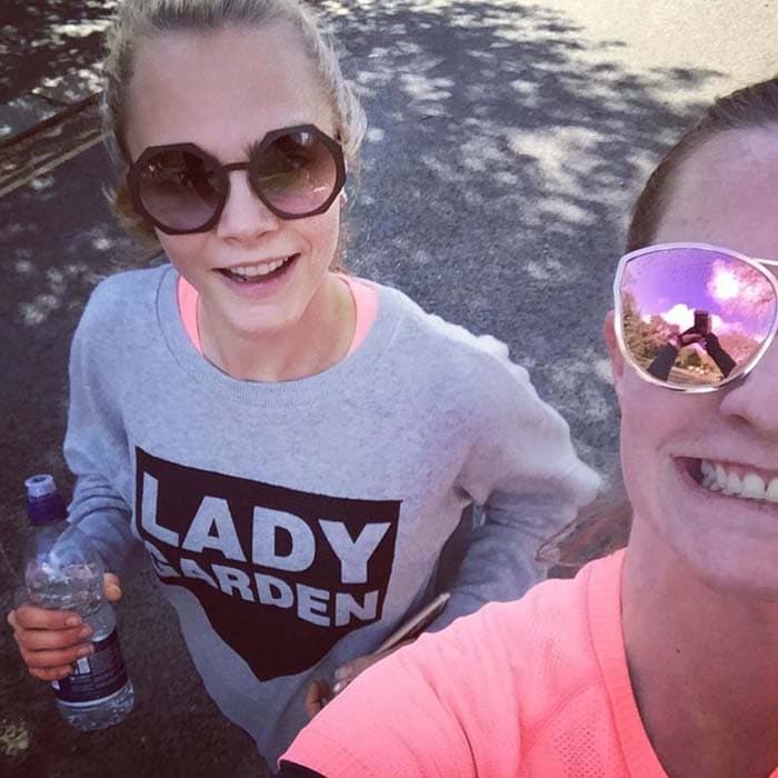 Cara Delevingne and Chloe Delevingne take a selfie while running a 5K charity race for Lady Garden
