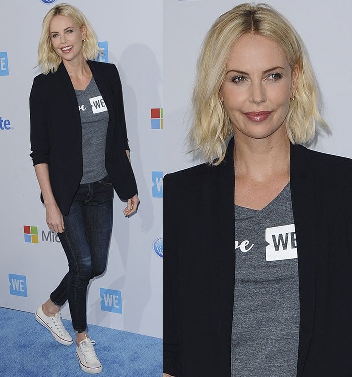 Charlize Theron keeps it effortlessly chic at WE Day California 2016, pairing a sharp black blazer and cuffed skinny jeans with classic white Converse Chuck Taylor All Star sneakers — a timeless off-duty staple that perfectly reflects her laid-back confidence