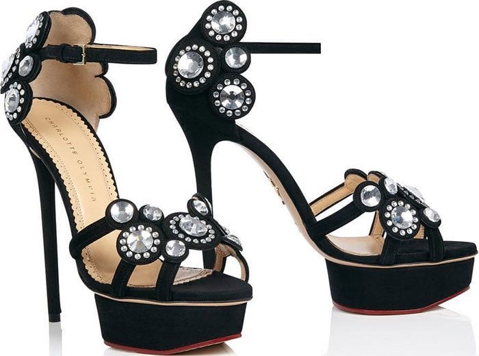 Charlotte Olympia’s aptly named “Precious” sandals feature crystal-embellished suede straps, sky-high stiletto heels, and a subtle platform that delivers maximum glamour and height