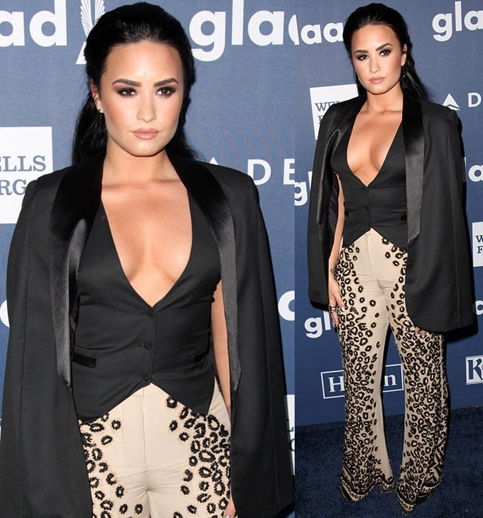 A sharply tailored satin-lapel waistcoat and statement animal-print trousers showcased Demi Lovato's confident approach to red-carpet dressing