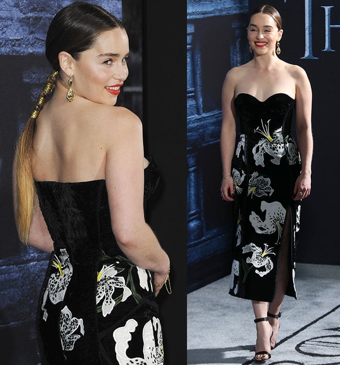 Turning to reveal the structured velvet bodice and sleek ponytail, Emilia Clarke’s look is grounded by delicate black Louboutin sandals that keep the focus on the dress’s bold floral embroidery