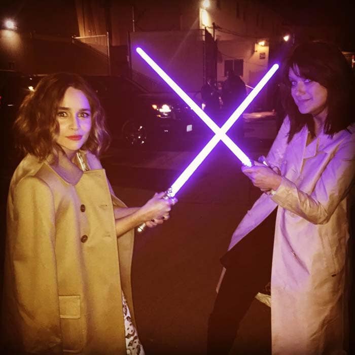 Emilia Clarke playfully crosses glowing lightsabers, teasing her transition into the Star Wars universe with a behind-the-scenes moment that blends off-duty charm with on-screen action energy