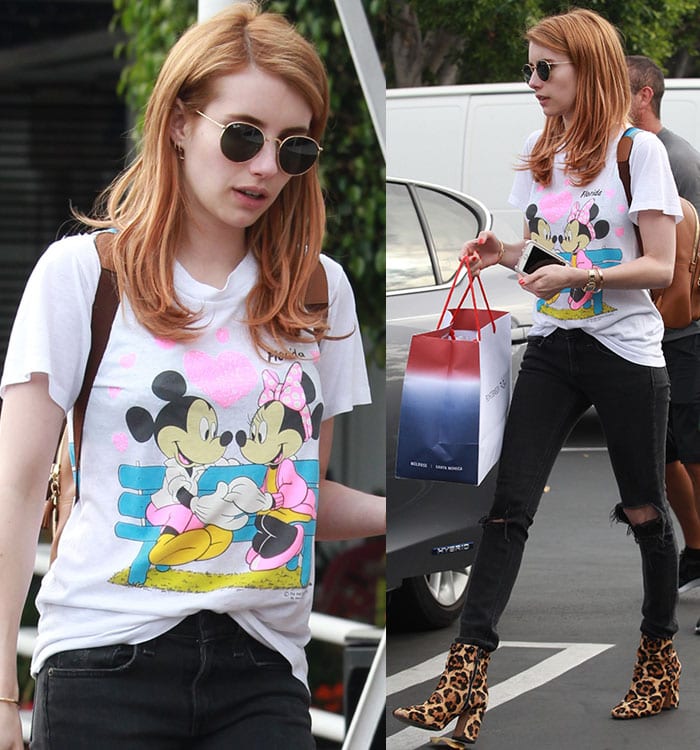 Emma Roberts wears a Mickey Mouse and Minnie Mouse graphic tee while out shopping