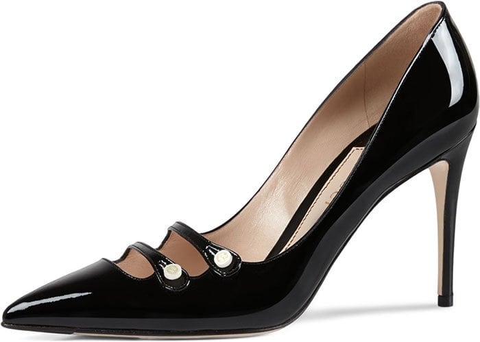 Black Gucci “Aneta” double-strap patent pumps, also originally priced at $695, offer a sleeker, more dramatic take on the silhouette with high-shine lacquered leather and delicate strap detailing