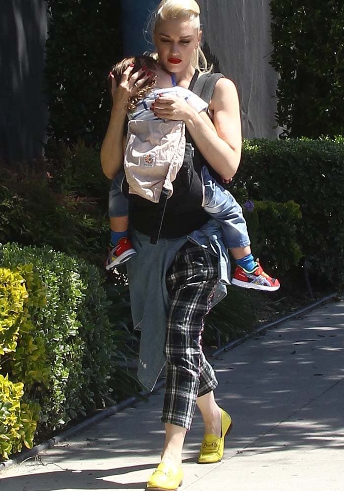 Gwen Stefani carries her youngest son, Apollo, while out in Los Angeles