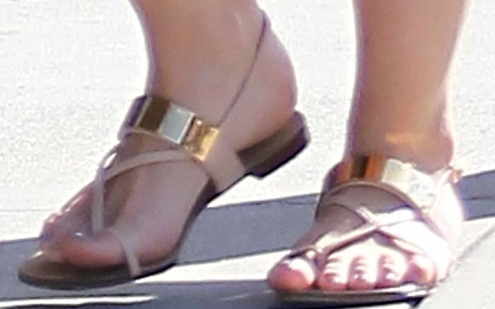 Giuseppe Zanotti's "Nuvorock" sandals combined slim blush straps with bold gold-tone hardware, creating a jewelry-like effect at the ankle