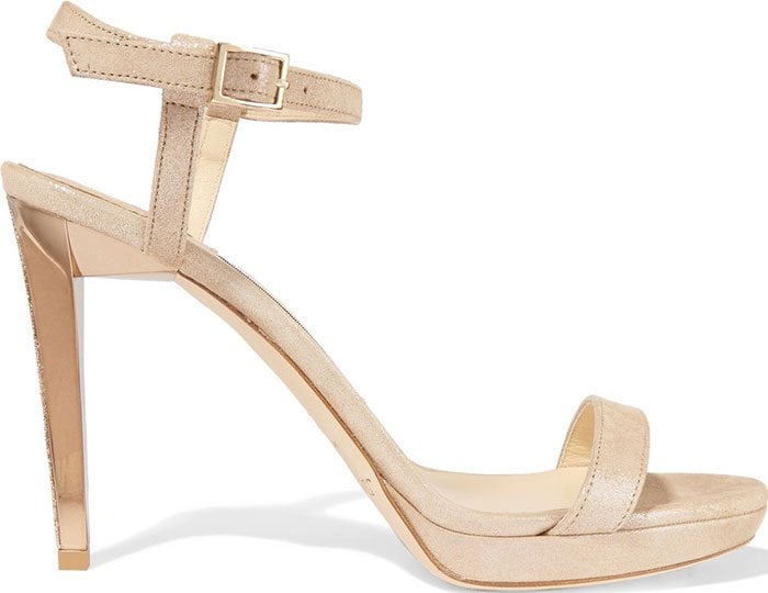 Shown on their own, the nude suede Jimmy Choo Claudette sandals emphasize the classic two-strap design that makes this style a timeless choice for formal occasions
