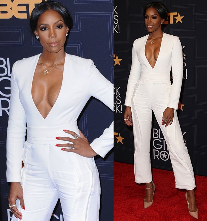 Kelly Rowland wears a star-shaped pendant necklace as an accessory to her cleavage