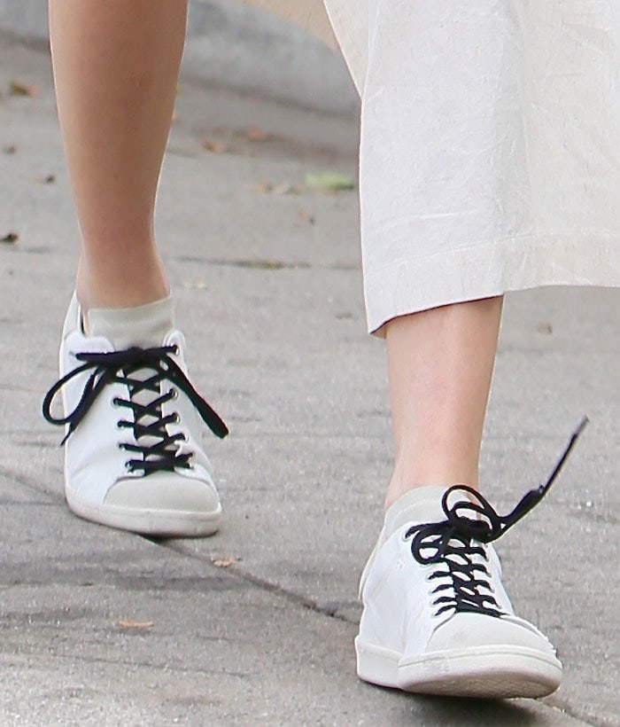 Kendall Jenner's Isabel Marant "Bart" sneakers combine smooth leather, canvas, and suede with contrasting black laces