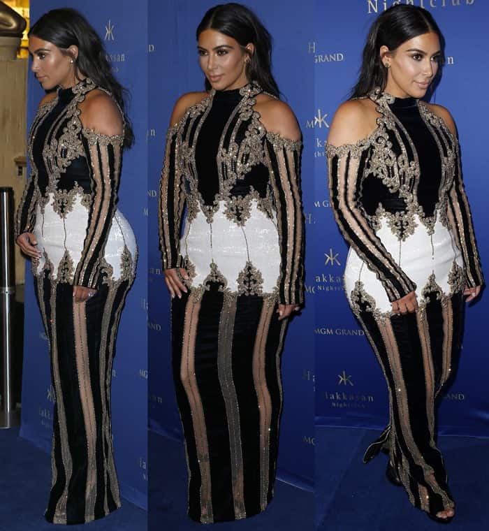 From every angle, the embellished gown’s bold stripes and ornate detailing commanded attention, showcasing Balmain’s signature maximalism
