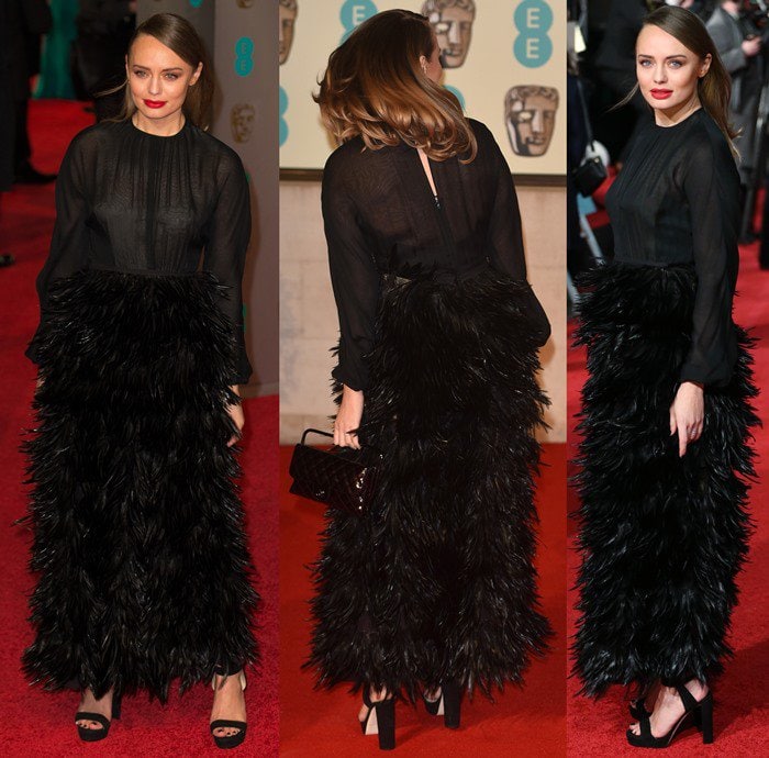 Laura Haddock styled her heels with an unflattering black gown with a crow-feathered skirt