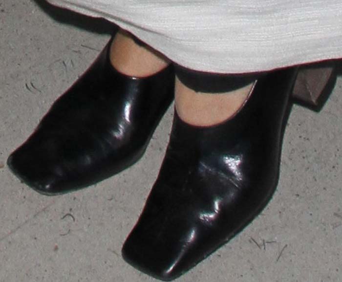 Mary-Kate Olsen sporting chic square-toed leather heels, embracing a minimalist yet bold fashion statement