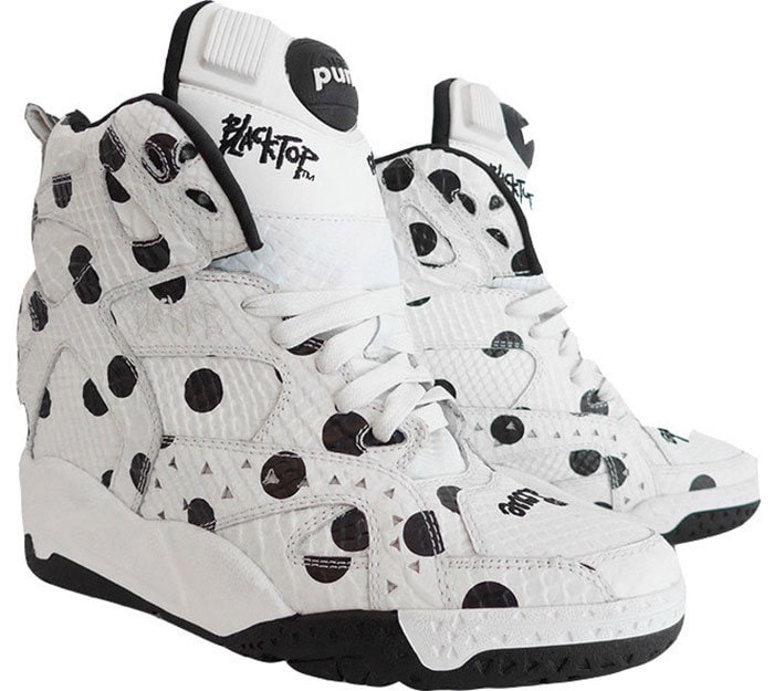 Melody Ehsani x Reebok Polka-Dot Blacktop wedge sneakers in white python-embossed leather with bold black dot detailing, originally retailing for $220
