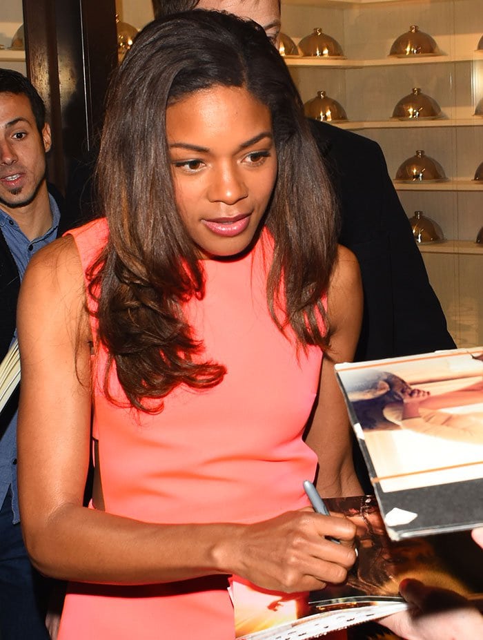 Naomie Harris wears her hair down at the Kate Spade New York Regent Street opening party