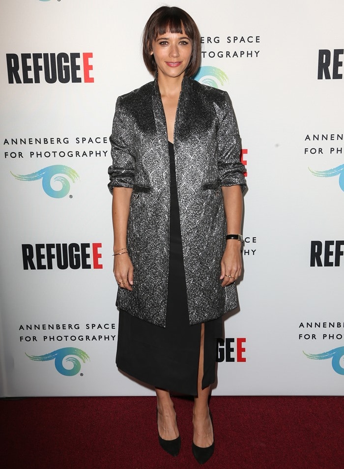 Rashida Jones paired a metallic Suno blazer with a sleek black midi dress and classic black pointy-toe pumps