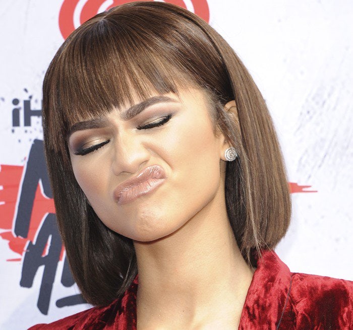 The sleek chin-length bob and softly blended smoky eye gave Zendaya's monochromatic Haider Ackermann look a sharp, modern edge that echoed the suit's precise tailoring