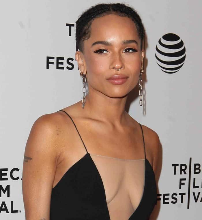 Zoë Kravitz exudes elegance in a sleek Alexander Wang gown, accessorized with chain-link earrings and her signature septum ring at the 2016 Tribeca Film Festival