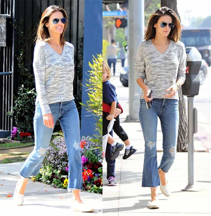 Alessandra Ambrosio pairs flared cropped Mother Denim jeans with a grey knit Feel The Piece sweater and gold Céline aviator sunglasses, finishing the relaxed California street look with minimalist slip-on shoes