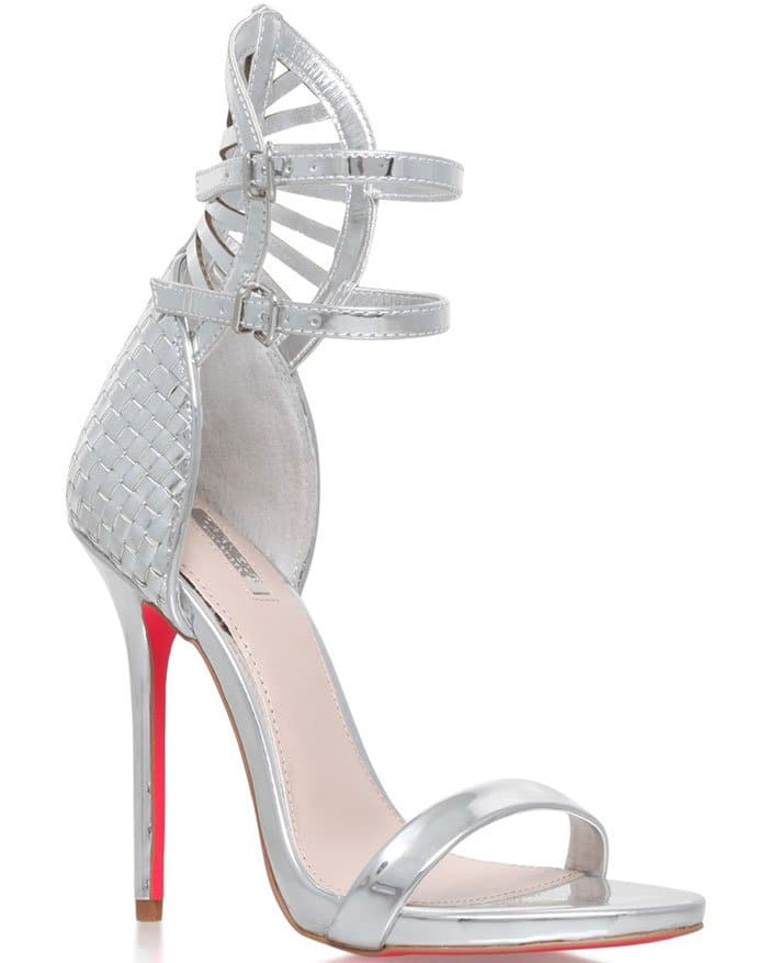 The Carvela Kurt Geiger "Gander" sandals retail for $200 and are crafted from high-shine synthetic material for a mirrored finish