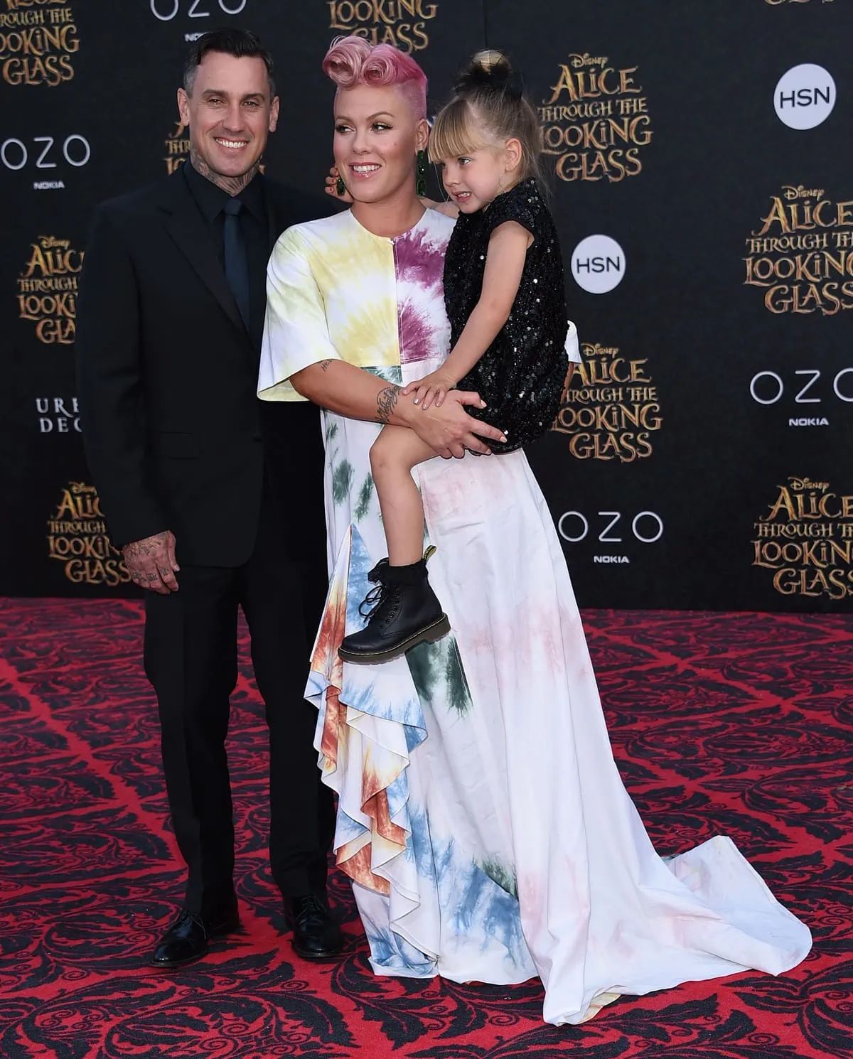 During the "Alice Through The Looking Glass" American Premiere on May 23, 2016, in Hollywood, Carey Hart commanded a height of 5′ 11″ (1.80 m), in contrast to Pink's stature of 5ft 3 (160 cm), alongside Willow Hart