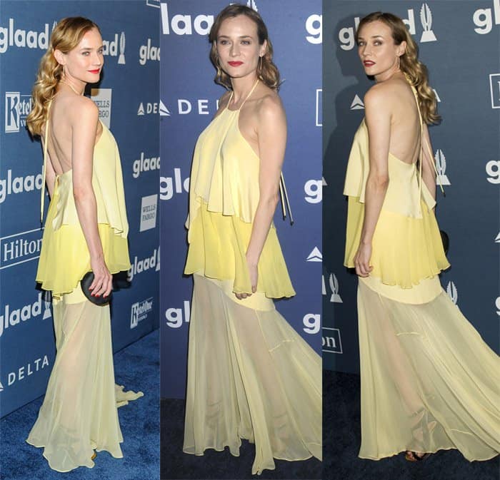 The vibrant yellow color complements Diane Kruger's fair complexion, and the sheer fabric adds a touch of ethereal elegance to the look, which she enhanced with hidden high heels to add height